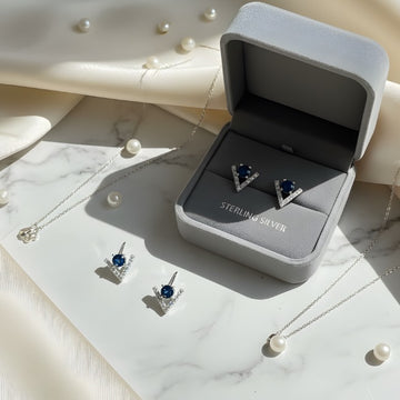 Modern V-Cut Earrings with Blue Center Stone – 925 Silver